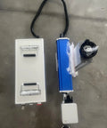 Top view of 30W Pro Grade Fiber Laser Engraver With Dual Cooling Fans And Integrated Power Supply Panic Button And Stable Raycus Core Laser For Easy Metal And Plastic Engraving For DIY Makers And Small Shops, showing the equipment layout on a concrete surface.