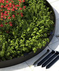 Metal Landscape Edging Stakes Kit With Twenty Pieces Eight And A Half Inch Garden Anchors for terrace boards shown in garden setup.