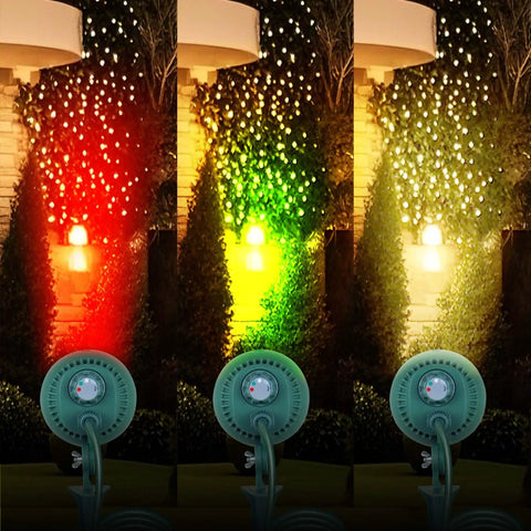 OSKOS Outdoor LED Christmas Waterproof Floodlight, 4.8W LED Waterproof Color Stake Light shining red, green, and white outdoors.
