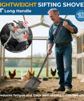 Man using 61 Inch Heavy Duty Sifter Shovel For Chicken Coops And Garden Soil Cleanup with long handle in chicken coop.