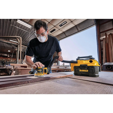 Man using 20V Max Brushless Orbital Sander Tool Only With Variable Speed Control 8000 To 12000 OPM Low Profile Body For Close Work Replaceable 8-Hole Hook And Loop Sanding Pad
