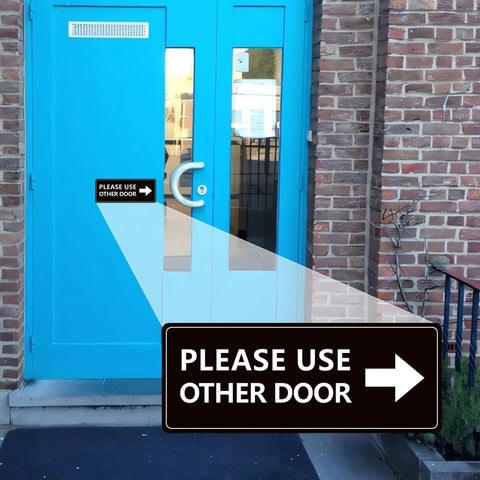 2 Pack Please Use Other Door Sign With Left Right Arrow Self Adhesive Weatherproof Vinyl Entrance Sticker on blue door.