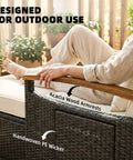 Rattan Outdoor Daybed With Storage Ottoman And Four In One Functionality Adjustable Backrest In Four Positions Folding Side Trays Acacia Wood Armrests Double Sun Lounger With Cushions And Pillows Beige, showing armrest detail and wicker design.