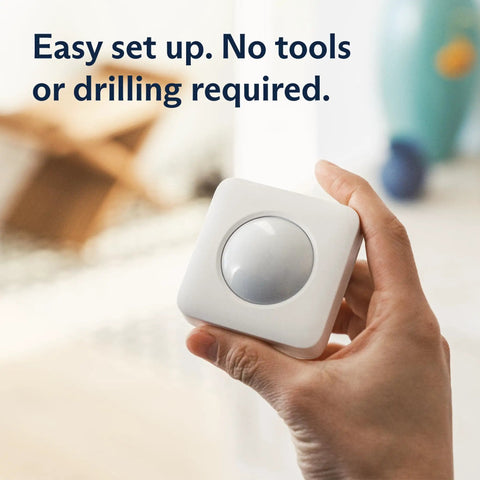 Dope Indoor Motion Sensor For Gen 3 Home Security System That Detects Movement Up To 30 Feet With A 90 Degree Field Of View For Corner Coverage In Large Rooms And Pet Friendly Design, white sensor in hand