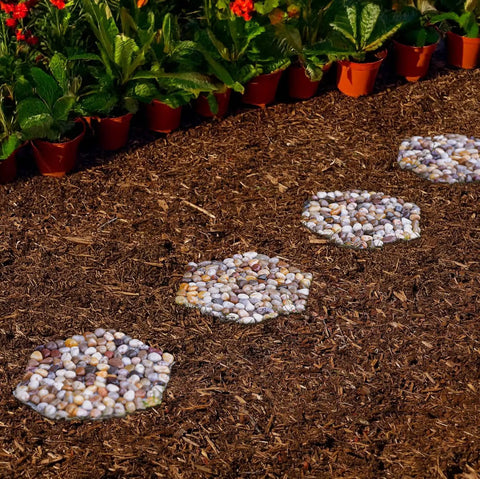 River Rock Stepping Stones Set Of 6 Hexagon Outdoor Garden Path Pavers Polished Pebbles in a garden pathway