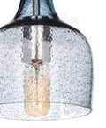 Close-up of blue hand-blown glass pendant light for kitchen island in modern farmhouse style ceiling hanging fixtures.