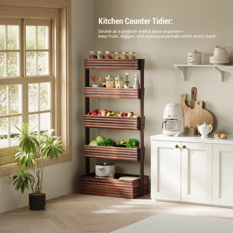 Vertical Wooden Five Tier Garden Bed With Five Planter Boxes Freestanding Plant Stand For Herbs Flowers Vegetables And Succulents Perfect For Small Spaces On Balconies Patios Or Indoors A Space Saver Carbonized Wood Finish For Outdoor Or Indoor Use in a kitchen setting holding produce and spices