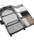 Front view of a gray rolling garment bag with spinner wheels, opened to reveal a suit, shirts, and mesh pockets.