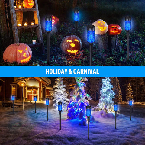8 Pack Blue Solar Torch Lights With Lit Flickering Flame For Outdoor Decor Waterproof Garden Yard Pathway Porch Festival Lighting Adjustable 18 To 25 Inch Height next to festive pumpkins and snow-covered trees