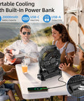 Rechargeable Camping Fan With 20000mAh Battery, LED Light, Hook on table with family enjoying outdoor gathering