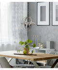 Dining room with six light indoor chandelier in brushed nickel finish with dramatic contemporary style for entryways and dining rooms