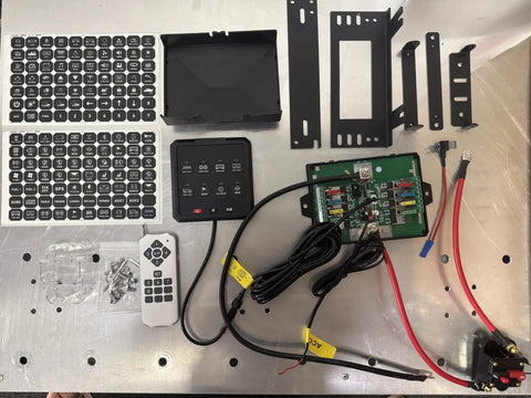 8 Gang Electronic Switch Panel For 12V Systems With LED Indicators and Remote Control, various components on a table.