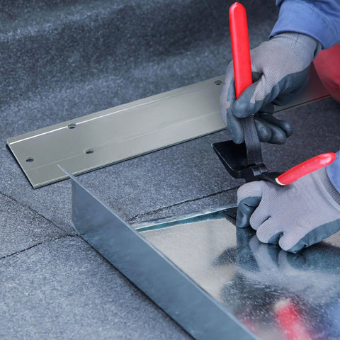 Close-up of a 24 Inch Folding Steel Sheet Metal Bender For HVAC Ductwork, Beefy, Heavy Duty Folding Tool used on steel panels.