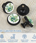 Set of 4 Sage Green Eucalyptus Leaves Drawer Knobs in Black Finish for Kitchen Cabinets and Bathrooms, on fabric surface
