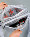 Clear Crossbody Shoulder Bag Designed For Cleanroom Crews And Tech Pros To Store Laptops And Tool Kits With Slick Zippers And Zero Sweat Everyday Carry Convenience For Jobsite Or Travel, showing interior tools and zippers.