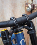 RSX Direct Mount Mountain Bike Stem for 31.8mm Bars, black lightweight split design on dual crown forks, close-up view