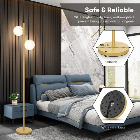Frosted Glass Globe Floor Lamp With Contemporary LED Lighting In Antique Brass Finish near bed, weighted base details.