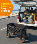 Heavy Duty Beach Cart With Big 9x4 All Terrain Wheels For Sand shown folded next to a packed vehicle trunk.