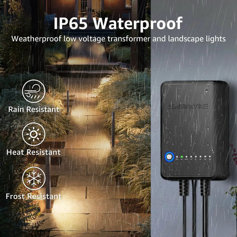 Image of All In One LED Low Voltage Landscape Lighting Kit 12 Pack With 60W Transformer showing waterproof transformer and pathway lighting in rain.