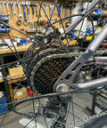 Rear view of bike with All In One Bike Chain Kit With 126 Links For 6/7/8 Speed Chains, Built In Chain Tool, Replacement Set