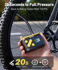 Hand using Mini Bike Pump With Gauge Auto Stop 120 Psi Portable Hand Pump For Mountain And Road Bikes Presta Schrader Valves Fast 20s Inflation Tiny Pocket Tire Inflator On The Go For Bicycles And Balls on a bike tire