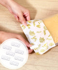 Woman using 30 Piece Vacuum Storage Bags Sealing Clip Reusable Zipper Labor Saver Sliding Grip for airtight food preservation in kitchen