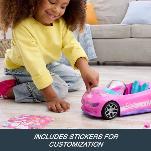 Child playing with Remote Control Pink Convertible RC Toy Car with Dual Driving Modes, customization sticker sheet visible