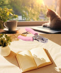Handy Metal Handled Paper Punch With 6mm Circle Hole, 6.3 Inch Length near book and cup, cozy and creative workspace