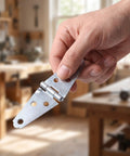Hand holding Heavy Duty Swing Door Hinges For Shed And Cafe Doors, Iron Strap Folding Hinges With Lengthened T Shape, Polished Finish, Multiple Predrilled Mounting Holes For Exterior Use, Whisper Quiet Motion, Built To Last, Exterior Grade.