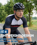 Badass Heavy Duty Safety Glasses Featuring Anti Fog And Scratch Resistant Lens For High Impact Protection And UV Blocking On Construction And DIY Sites Ansi Certified In Black worn by cyclist on road