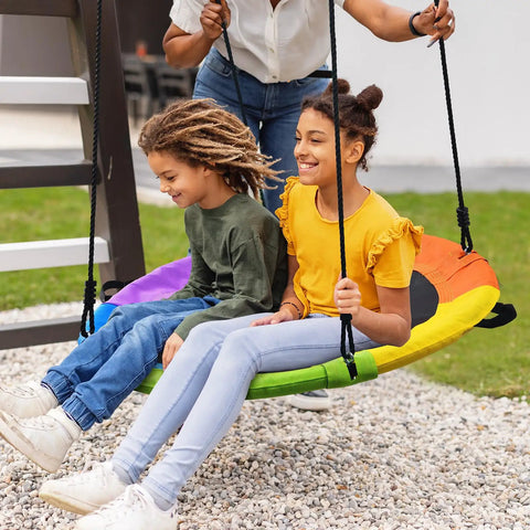 700 Lb 40 Inch Rainbow Saucer Tree Swing For Kids And Adults Outdoor, two children swinging on colorful Textilene fabric