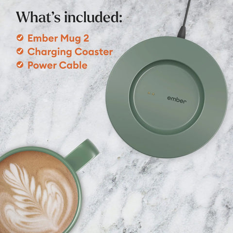 Slick App Controlled 14 Oz Smart Heated Coffee Mug With Rechargeable Base And Glow Led Display Keeps Your Joe Piping Hot From First Sip To Final Drop Certified Renewed For Daily Grind on a marble surface with charging coaster and power cable.