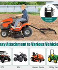 66 Inch Wide Tow Behind Driveway Drag Harrow With Reinforced Bars attached to garden tractor for soil leveling demonstration
