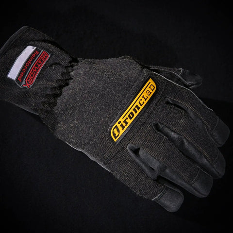 Heat Resistant Work Gloves With Kevlar Liner And HotShield Technology Reinforced Palm For Superior Heat And Cut Protection Up To 450 Degrees Fahrenheit Durable Black Pair For Welding Metalworking And More shown from top view highlighting reinforced palm.