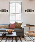4-Light Industrial Farmhouse Vanity Lights With Rustic Wood And Clear Glass, Modern Metal Wall Sconce in a cozy living room setting