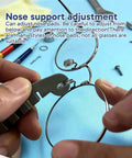 Adjusting eyeglass nose pads with Glasses Tightening Kit With 2 Pcs And 20 Ultra Soft Nose Pads, tools visible on blue surface.