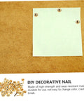 100 Pieces Decorative Craft Nails For DIY Projects shown securing paper on wood surface