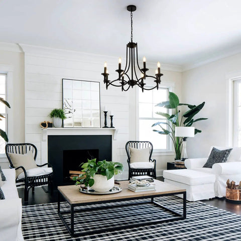 Industrial Candle Chandelier In Black Iron With Eight Lights in modern farmhouse living room.