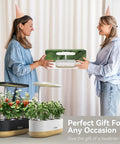 Women exchanging a 12 Pod Hydroponics Growing System For Indoor Herb Garden With Full Spectrum LED Grow Light gift.