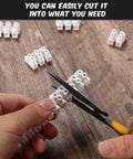 Person cutting 12-Position Dual Row White Screw Terminal Block Set 10 A 380 V Wire Connector Electrical Barrier Block