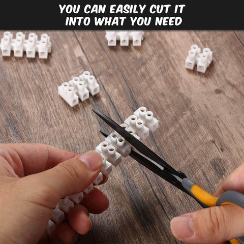 Person cutting 12-Position Dual Row White Screw Terminal Block Set 10 A 380 V Wire Connector Electrical Barrier Block