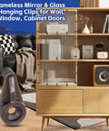 Heavy Duty Brown Mirror Hanging Clips 25 Pack Easy Snap Glass Retainer Brackets For Cabinets And Vanities on display with furniture.