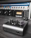 iD4 MkII Audio Interface With Class A Mic Preamps, USB C High Speed, compact black desktop interface on sound studio desk