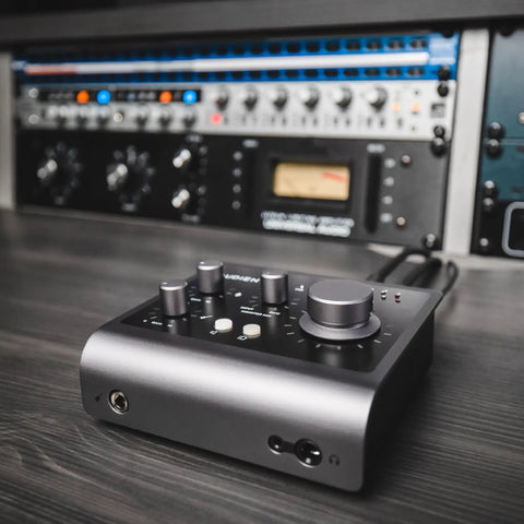 iD4 MkII Audio Interface With Class A Mic Preamps, USB C High Speed, compact black desktop interface on sound studio desk
