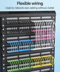Slim Blue Cat6 Patch Cables 0.5 Feet 10 Pack in network rack, showcasing flexible wiring for home and office networking.