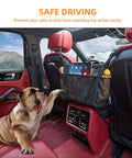 Car Net Pocket Organizer Between Seats For Handbags And Purses displayed in a car with a dog in front, holding items, black mesh.
