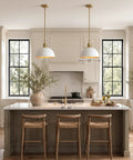 Caiselee 13 in Dome Pendant Light, 1-Light White and Gold Pendant Lighting hanging above a kitchen island with wood bar stools.