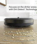 Roomba Combo I5 Plus Self Emptying Robot Vacuum And Mop with Smart Mapping on wood floor detecting dirt with sensors.