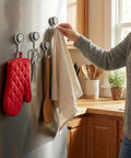 Six Piece Heavy Duty Magnetic Hooks With Smooth Swivel Action And Fresh Smiley Vibe For Keeping Your Fridge Locker Or Garage Slick While Hauling Heavy Gear At 60 Lbs, holding kitchen utensils on a fridge.