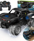 Amphibious 4WD RC Monster Truck With Waterproof Design, 1:16 Scale, Dual Rechargeable Batteries displayed with controller